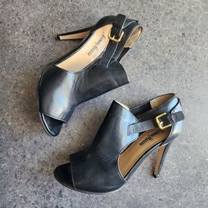 Elegant Black Stiletto Heels with Slingback Design